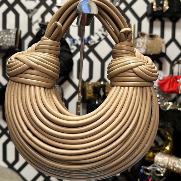 A rope purse holds very few items example phone lipstick keys handheld purse - Picture 7 of 10